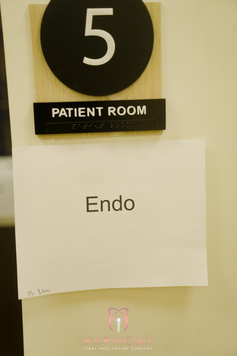 The image shows a sign on a door that reads Endo with an arrow pointing left.